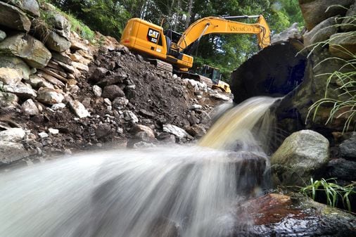 Removing the dam helps the environment, but is bittersweet for pond owners